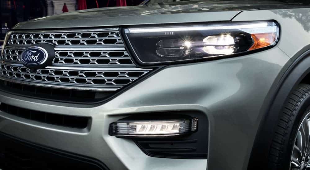 The lamps and bulbs from the headlights on a 2020 Ford Explorer are lit up.