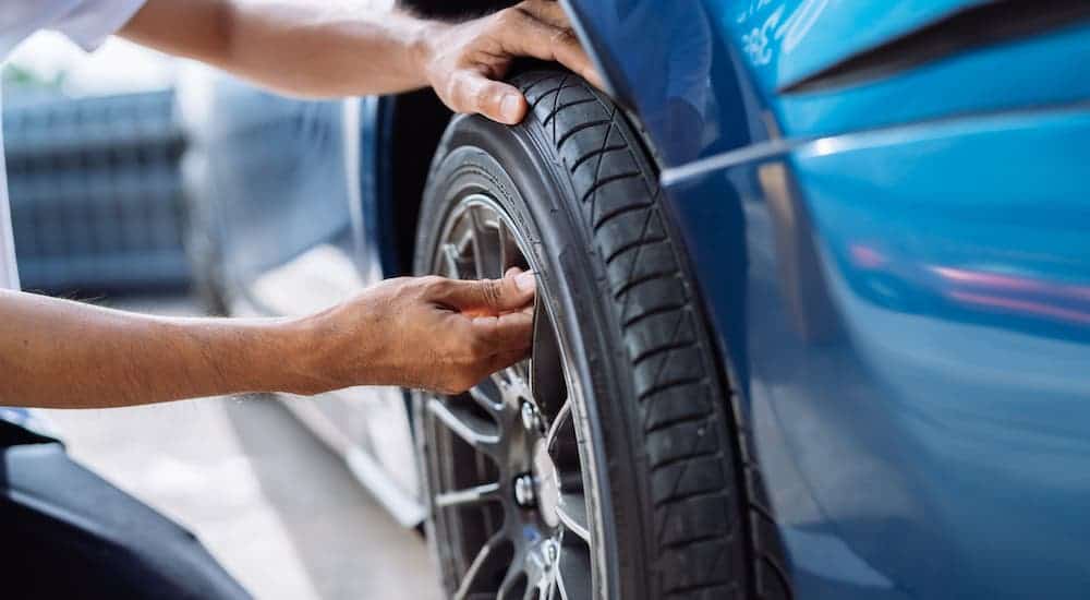 As a typical Ford service near you, someone will inspect your tires, shown here.