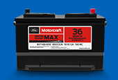 A Motocraft car battery on a blue background